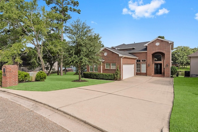 6051 Longmire Trl, Conroe, TX 77304 - traditional-style home featuring brick siding, a garage, concrete driveway, and a front yard