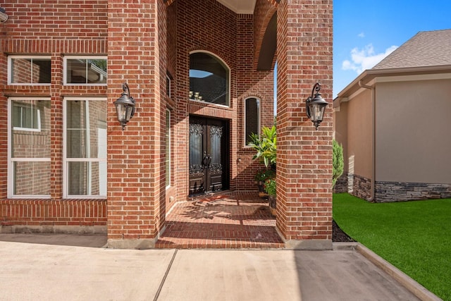 6051 Longmire Trl, Conroe, TX 77304 - property entrance featuring french doors and brick siding