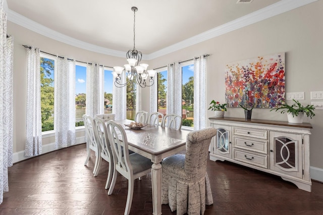 6051 Longmire Trl, Conroe, TX 77304 - dining space with a chandelier, healthy amount of natural light, dark wood-style floors, and ornamental molding