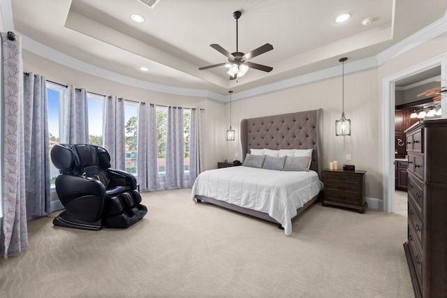 6051 Longmire Trl, Conroe, TX 77304 - bedroom with a tray ceiling, light carpet, ornamental molding, recessed lighting, and ceiling fan
