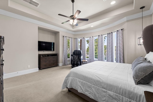 6051 Longmire Trl, Conroe, TX 77304 - carpeted bedroom featuring a tray ceiling, recessed lighting, ceiling fan, and ornamental molding