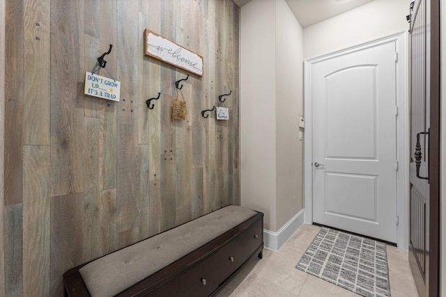 6051 Longmire Trl, Conroe, TX 77304 - mudroom with light tile patterned floors and baseboards