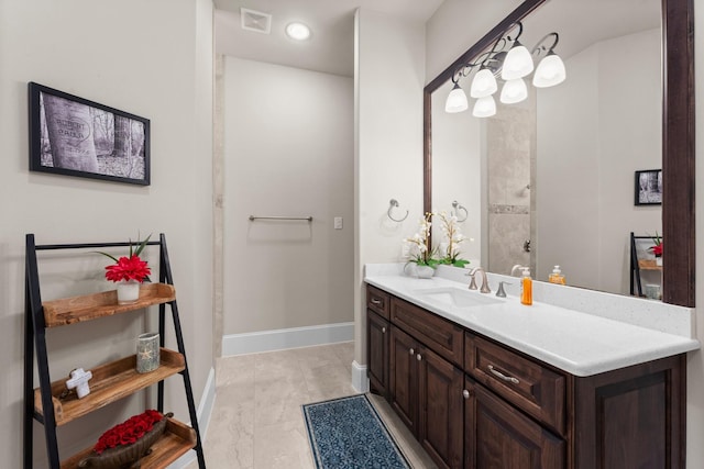 6051 Longmire Trl, Conroe, TX 77304 - full bath featuring vanity and baseboards