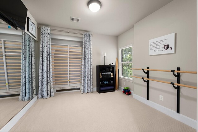 6051 Longmire Trl, Conroe, TX 77304 - misc room featuring carpet and baseboards