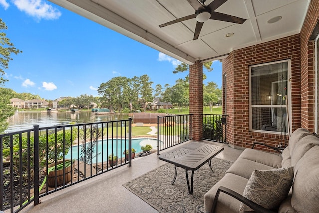 6051 Longmire Trl, Conroe, TX 77304 - balcony featuring view of pool area, ceiling fan, and a water view