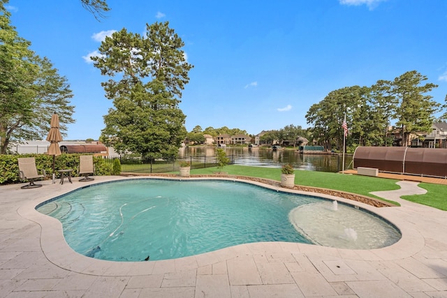 6051 Longmire Trl, Conroe, TX 77304 - view of pool featuring a patio area, a fenced backyard, and a water view