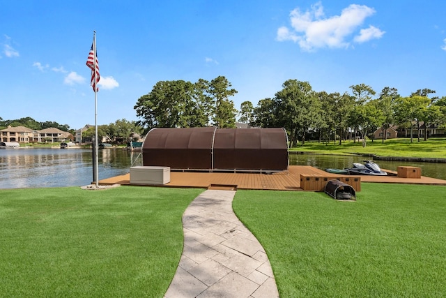6051 Longmire Trl, Conroe, TX 77304 - view of grassy yard featuring a water view