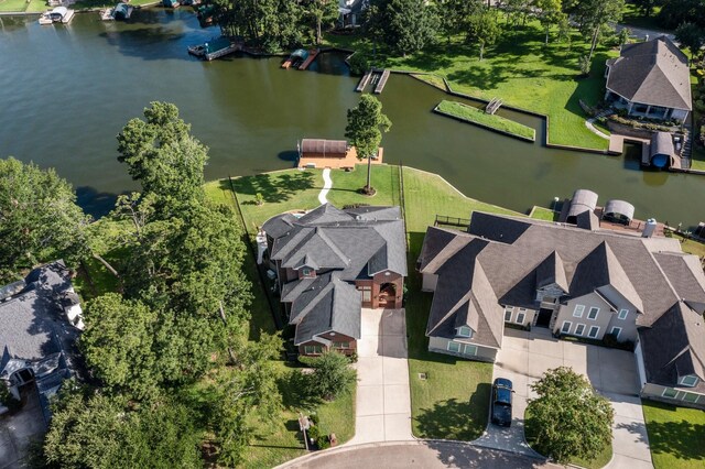 6051 Longmire Trl, Conroe, TX 77304 - aerial view of property's location featuring a nearby body of water