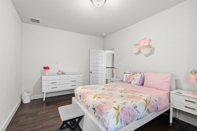 27915 Round Moon Ln, Katy, TX 77494 - bedroom with dark wood finished floors