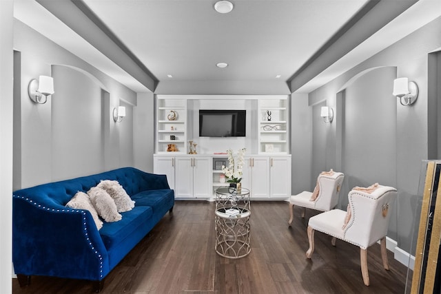 27915 Round Moon Ln, Katy, TX 77494 - living area featuring dark wood-type flooring, built in shelves, and recessed lighting