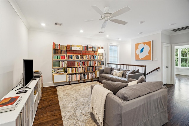 712 E 14th St, Houston, TX 77008 - living room with crown molding, a ceiling fan, dark wood-type flooring, and recessed lighting