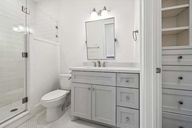 712 E 14th St, Houston, TX 77008 - bathroom featuring vanity, a shower stall, tile patterned floors, and a closet