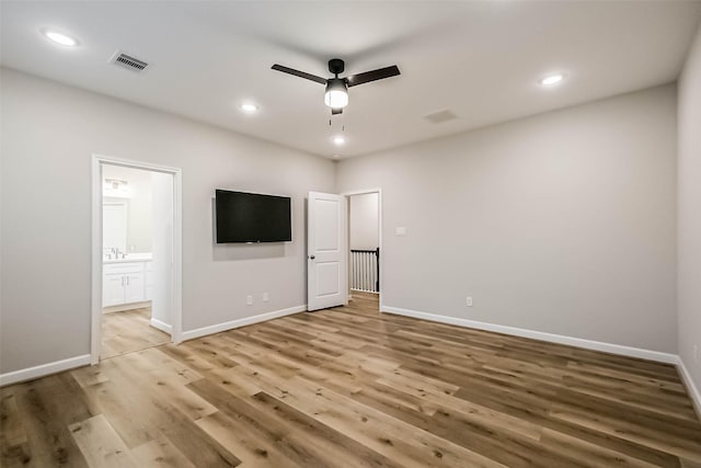 2353 Hoskins Dr, Houston, TX 77080 - unfurnished bedroom with light wood finished floors, ensuite bath, recessed lighting, and a ceiling fan