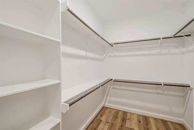 2353 Hoskins Dr, Houston, TX 77080 - spacious closet with light wood finished floors