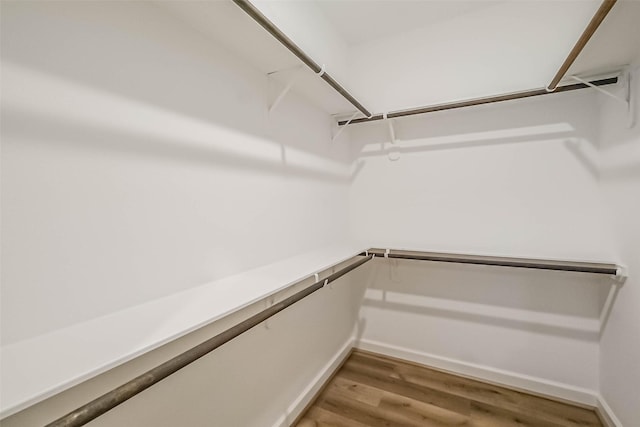 2353 Hoskins Dr, Houston, TX 77080 - walk in closet featuring wood finished floors