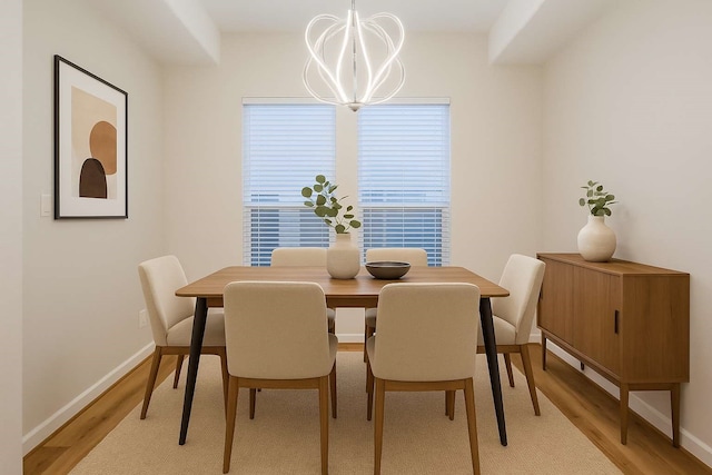 2353 Hoskins Dr, Houston, TX 77080 - dining room featuring light wood-style flooring and a chandelier