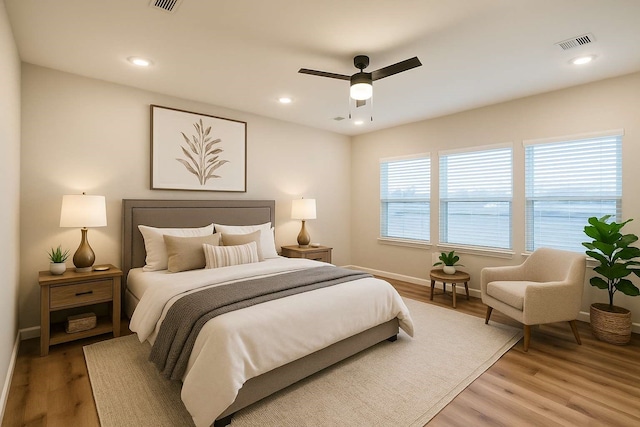 2353 Hoskins Dr, Houston, TX 77080 - bedroom with light wood-style flooring, a ceiling fan, and recessed lighting