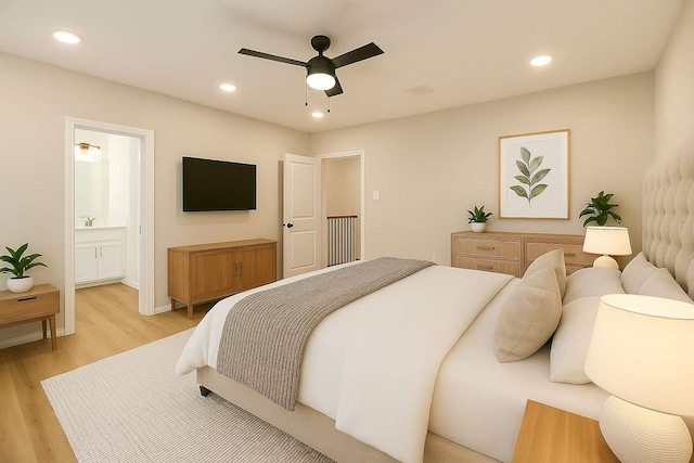 2353 Hoskins Dr, Houston, TX 77080 - bedroom with light wood-style flooring, recessed lighting, connected bathroom, and a ceiling fan