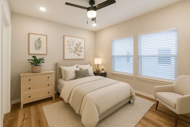 2353 Hoskins Dr, Houston, TX 77080 - bedroom with light wood-type flooring, recessed lighting, and a ceiling fan