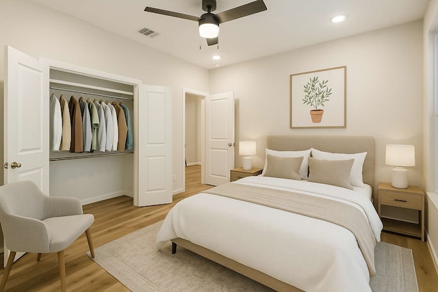 2353 Hoskins Dr, Houston, TX 77080 - bedroom with light wood-style floors, recessed lighting, ceiling fan, and a closet