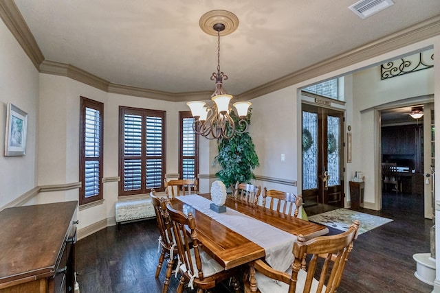 407 Pickney Ave, Sugar Land, TX 77479 - dining room with a chandelier, wood finished floors, french doors, and ornamental molding