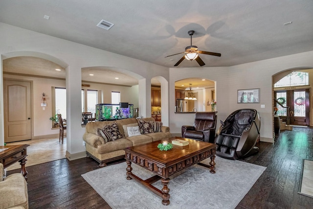 407 Pickney Ave, Sugar Land, TX 77479 - living room with healthy amount of natural light, a ceiling fan, and wood finished floors