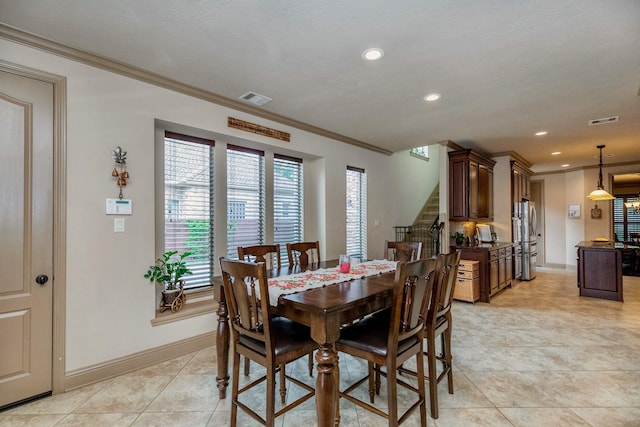 407 Pickney Ave, Sugar Land, TX 77479 - dining area with stairway, ornamental molding, recessed lighting, and light tile patterned floors