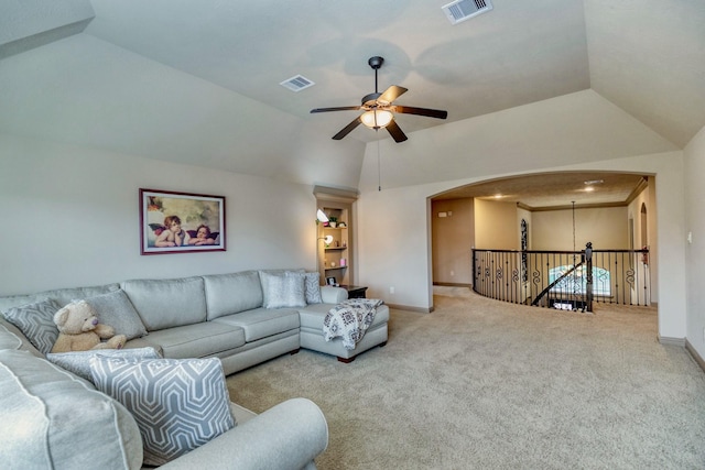 407 Pickney Ave, Sugar Land, TX 77479 - living area with lofted ceiling, a ceiling fan, carpet flooring, and arched walkways