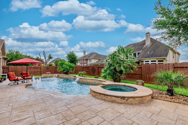 407 Pickney Ave, Sugar Land, TX 77479 - view of swimming pool with a patio area, a fenced backyard, and a pool with connected hot tub