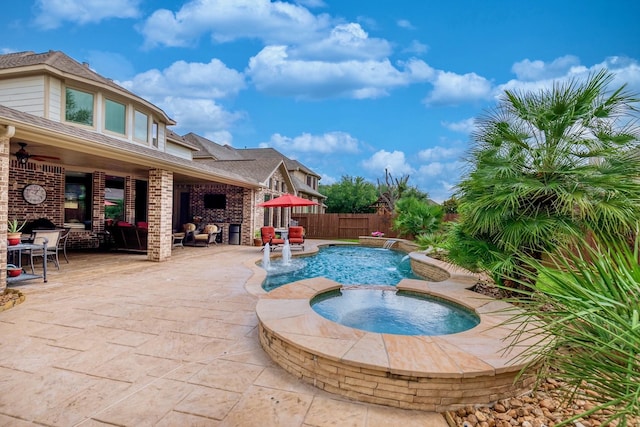 407 Pickney Ave, Sugar Land, TX 77479 - view of pool with a patio area, a fenced backyard, and a pool with connected hot tub