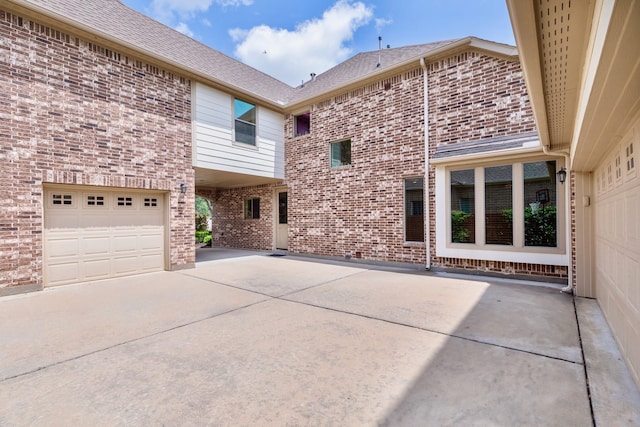 407 Pickney Ave, Sugar Land, TX 77479 - view of patio / terrace with driveway and an attached garage