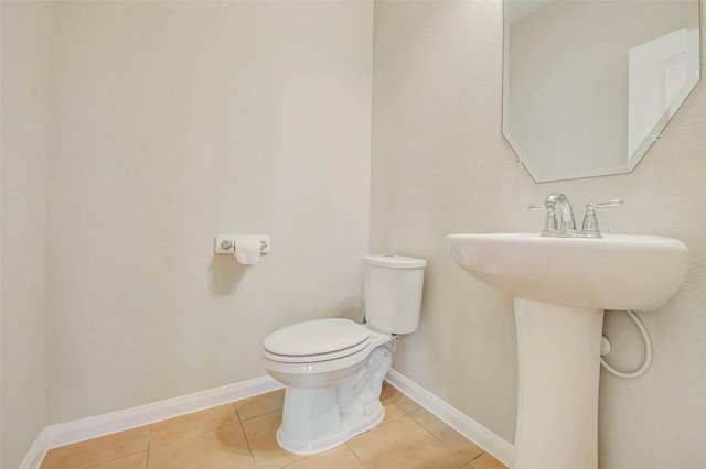 20311 Towering Cypress Dr, Cypress, TX 77433 - half bathroom featuring toilet and tile patterned flooring