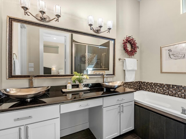 1437 Wagner St, Houston, TX 77007 - bathroom featuring double vanity, a bath, and a stall shower