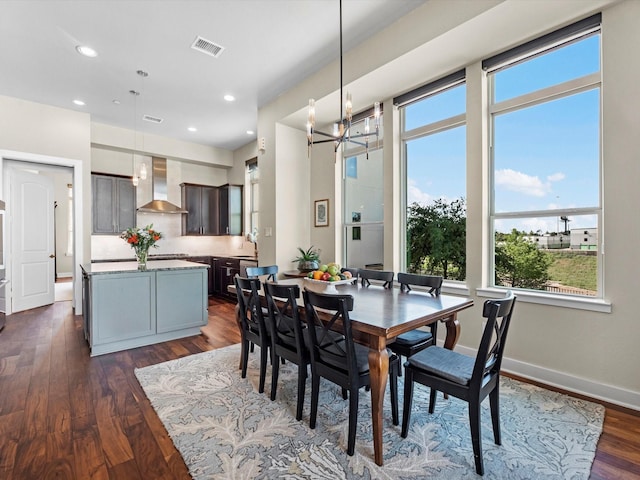 1437 Wagner St, Houston, TX 77007 - dining area featuring dark wood finished floors, a chandelier, and recessed lighting