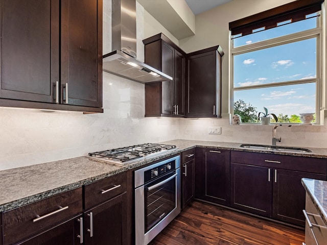 1437 Wagner St, Houston, TX 77007 - kitchen with stainless steel appliances, wall chimney range hood, plenty of natural light, and dark wood-type flooring