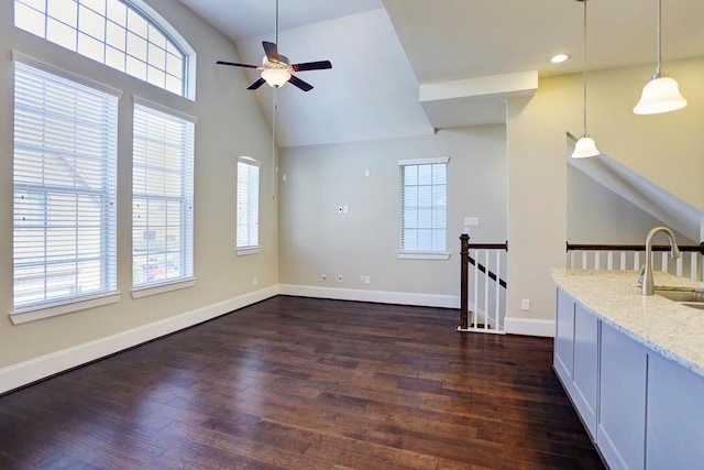 11005 Acorn Falls Dr, Houston, TX 77043 - unfurnished living room featuring a ceiling fan, dark wood-type flooring, high vaulted ceiling, and recessed lighting