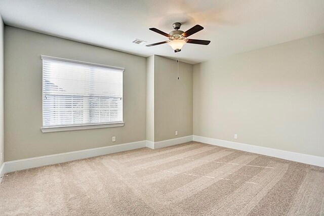 11005 Acorn Falls Dr, Houston, TX 77043 - carpeted spare room featuring ceiling fan and baseboards