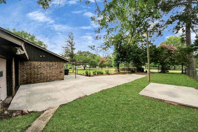 30718 N Cripple Creek Dr, Magnolia, TX 77354 - view of yard with a patio