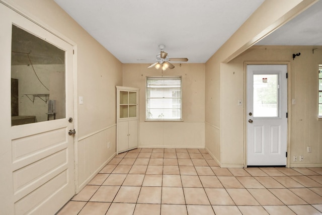 30718 N Cripple Creek Dr, Magnolia, TX 77354 - unfurnished dining area with a ceiling fan and light tile patterned floors
