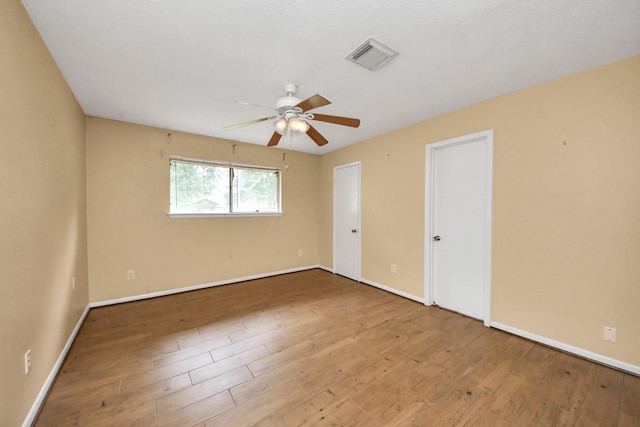 30718 N Cripple Creek Dr, Magnolia, TX 77354 - unfurnished bedroom with wood finished floors and ceiling fan