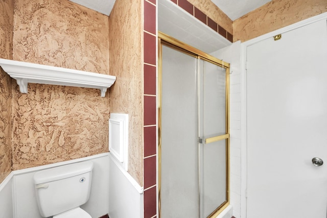 30718 N Cripple Creek Dr, Magnolia, TX 77354 - bathroom featuring wainscoting, a stall shower, and wallpapered walls