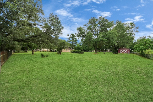 30718 N Cripple Creek Dr, Magnolia, TX 77354 - view of yard with a barn and an outdoor structure