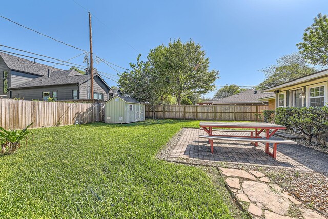 2018 Wakefield Dr, Houston, TX 77018 - fenced backyard with a storage shed and a patio