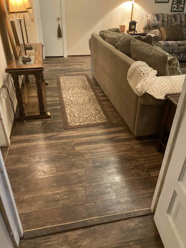 1305 E Goliad Ave, Crockett, TX 75835 - living room with dark wood-style flooring