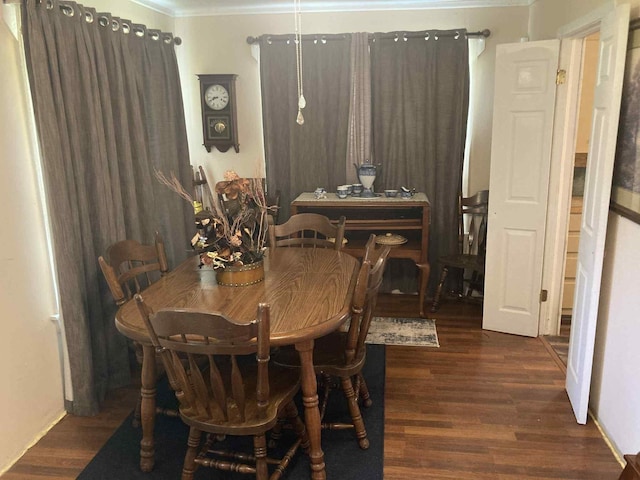 1305 E Goliad Ave, Crockett, TX 75835 - dining room featuring wood finished floors and crown molding