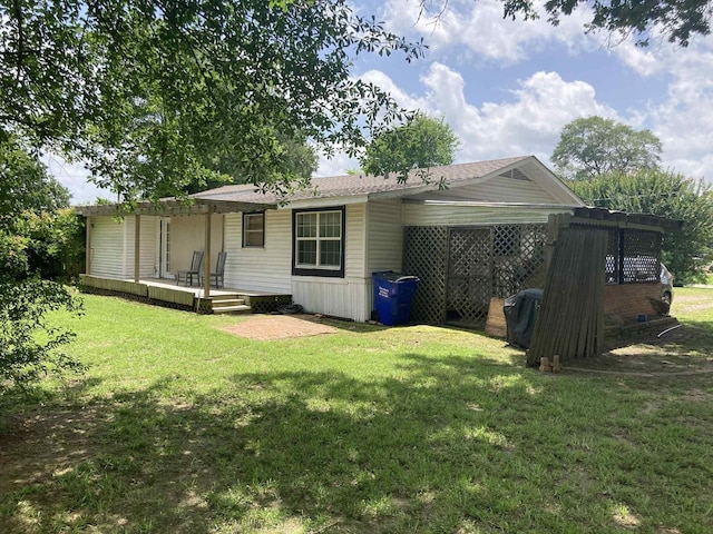 1305 E Goliad Ave, Crockett, TX 75835 - back of property with a yard