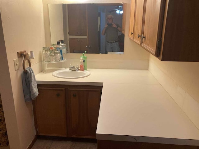 1305 E Goliad Ave, Crockett, TX 75835 - bathroom featuring vanity and ceiling fan