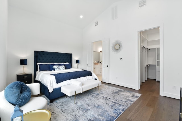 3913 Hare St, Houston, TX 77020 - bedroom featuring high vaulted ceiling, wood finished floors, ensuite bathroom, and recessed lighting