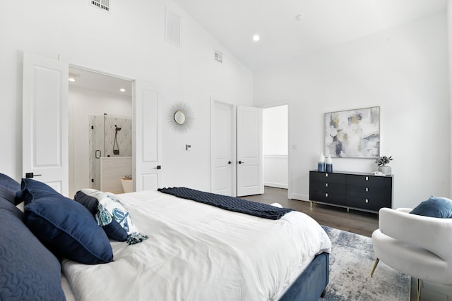 3913 Hare St, Houston, TX 77020 - bedroom featuring high vaulted ceiling, wood finished floors, recessed lighting, and connected bathroom