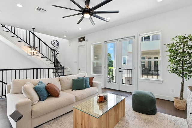 3913 Hare St, Houston, TX 77020 - living room with a ceiling fan, recessed lighting, light wood-type flooring, and stairs
